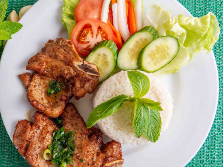 Chuleta De Cerdo Con Arroz