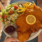 Putenschnitzel Mit Pommes Frites Und Salat