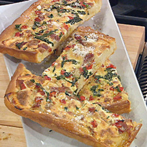 Romana Americana Una Pizza Más Grande, Más Delgada Y Más Crujiente